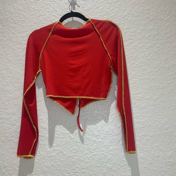 Stretchy orange shrug. - Picture 2 of 3